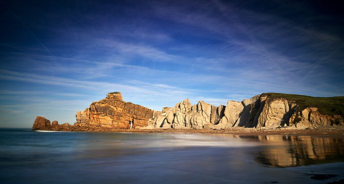 Beautiful rock formations on Playa de Portio, Cantabria, Spain