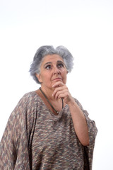 thoughtful senior woman on white background