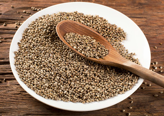 Hemp seeds on wooden table