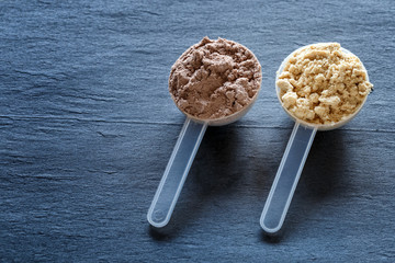 Scoops filled with protein powders