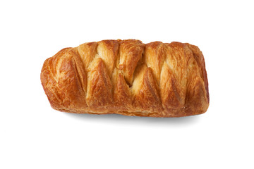 Baked bun with a beautiful pattern of puff pastry. Isolate on white background with shadow.