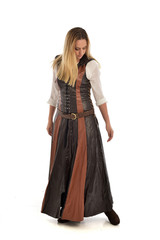 Fototapeta premium full length portrait of girl wearing brown fantasy costume. standing pose on white studio background. 