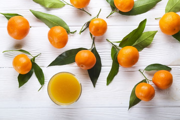 Mandarin Oranges on rustic white wooden background