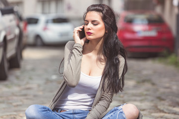 Cute urban girl talking on the phone.