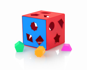 Colorful children's toy shape sorter isolated on white background with shadow reflection. The cubed...