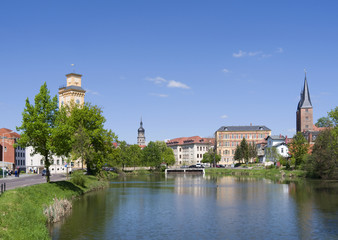 Altenburg / Germany: View over the „Little Pond“ to waterworks tower, St. Bartholomew steeple, Martin Luther School and the „Red Spires“