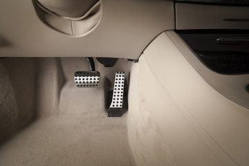 Brake and accelerator pedal of automatic transmission car, modern luxury car interior details