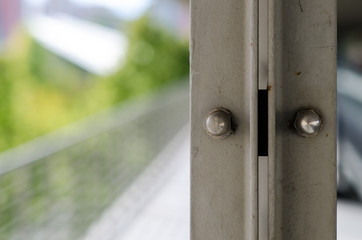 Architecture, special construction with steel beams, bolts and tightening nuts.