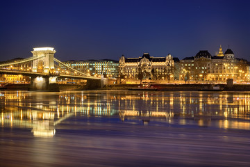 Fototapeta na wymiar Széchenyi István square night view across Danube river, Szechenyi chain bridge, Budapest