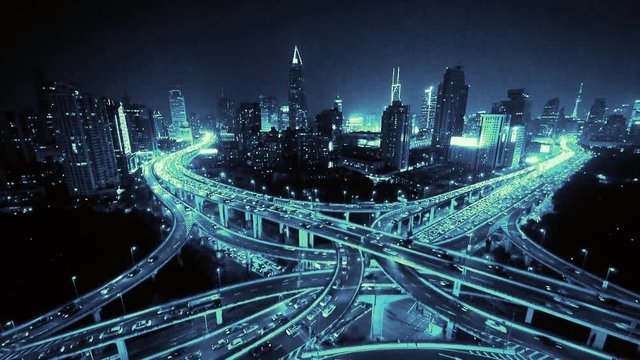 Aerial View of freeway busy city rush hour heavy traffic jam highway,shanghai Yan'an East Road Overpass interchange,driving racing by with streaking lights trail with super long exposures.
