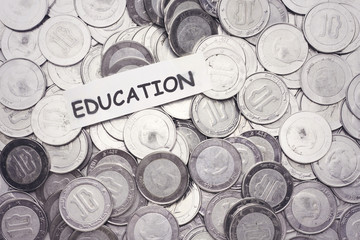 save money concept,tag education above algeria coin