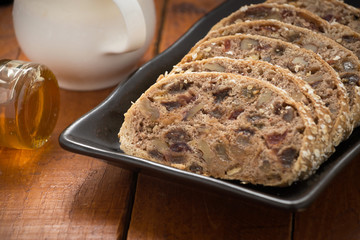 Fruit Loaf or bread with raisins also known as Bara Brith and milk

