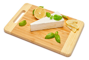 brie or camambert cheese on white background