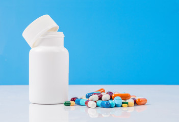 bottle and mixed pills.