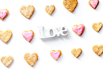 cookies for Valentine Day heartshaped white background top view 