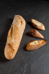 baguette with toast on a dark background