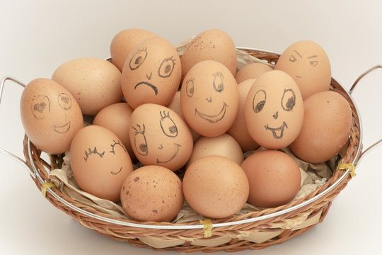 Organic eggs for Easter with emoticons