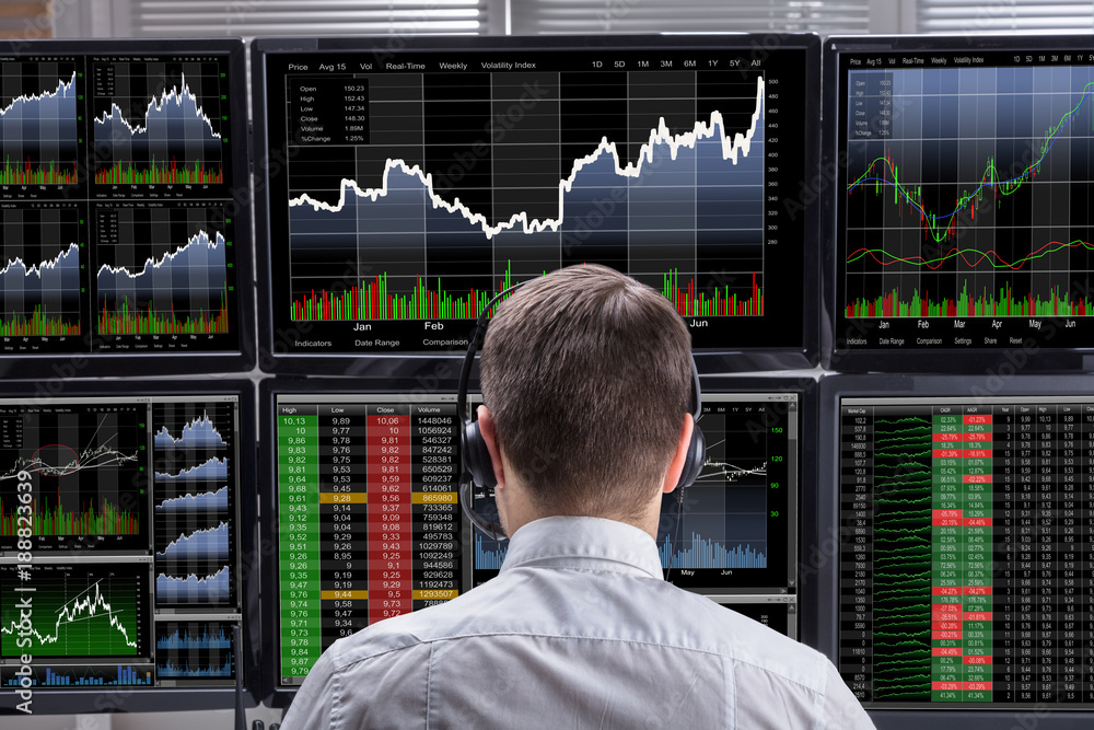 Poster stock market broker analyzing graphs on computer screens