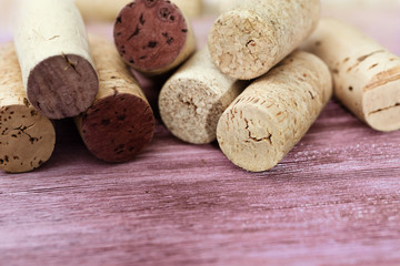 Wine corks close up, bang of the bottle on old vinous wood. Background for wine list.