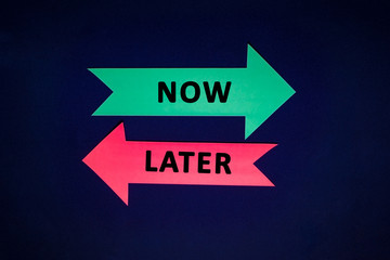 conceptual colored arrows on the dark blue texture background. Now, later.