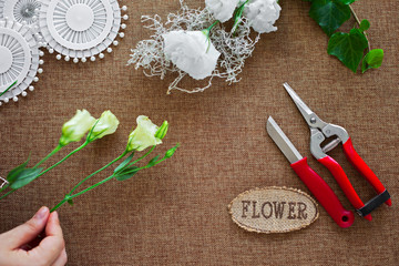 Florist woman making beautiful bouquet.  