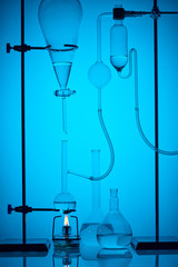 chemical analysis with substance in laboratory on blue