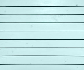 Light blue wooden horizontal boards decoration as background.