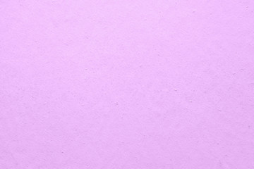 Wall painted in pink color texture background.