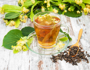 cup of herbal tea with linden flowers