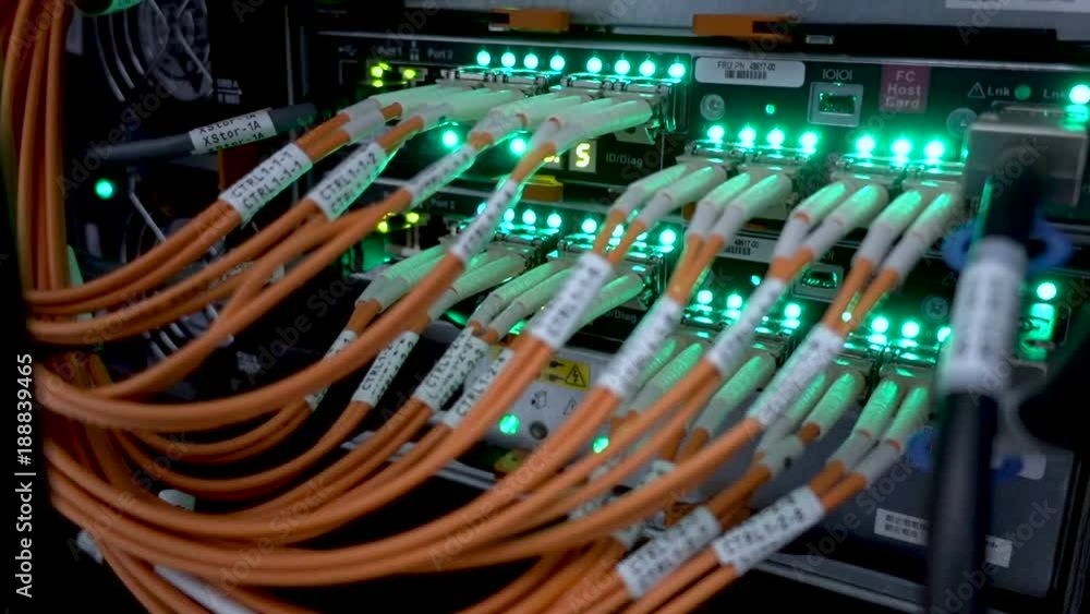 Poster fiber optical connector interface. rack mounted servers in a server room, server rack audio cable. s