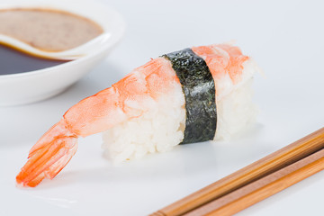 Japanese cuisine. Appetizing shrimp and rice on light background
