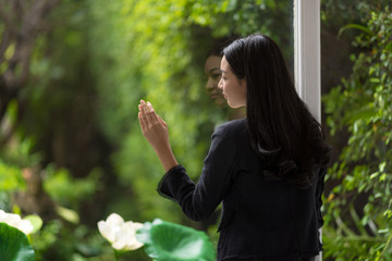 beautiful young business woman and thinking about something