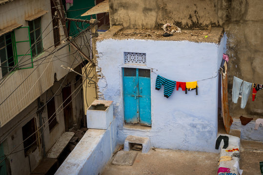 laundry and a colorful door in Jodhpur, Rajasthan