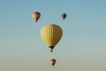 Hot air balloons flying in blue sky