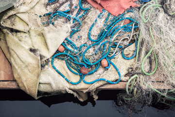 top view of fishing net, marine or nautical themed background