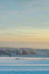 View into winter landscape few minutes after sunrise