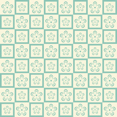 Flowers on a blue background. Seamless floral pattern. Spring background. Cherry blossoms. Blooming cherry.