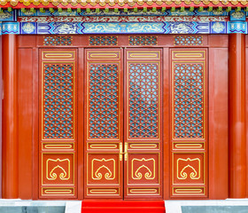 Fototapeta na wymiar Traditional Chinese doors in The Palace Museum (Forbidden City). Located in Beijing, China.