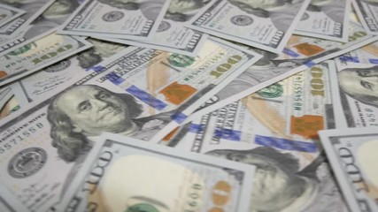 Dollar bills, money background. Dollars money set with count to bills of one hundred dollars. Portrait of George Washington closeup on the bills for a hundred dollars. Dollars, money close up.