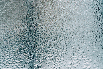 Fototapeta na wymiar water drops on glass, window with condensation, close-up