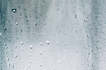 water drops on glass, window with condensation, close-up - obrazy, fototapety, plakaty