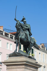 Sculpture of the king Victor of Emmanuil II (1887) close up against the background of the blue sky. Venice. Italy