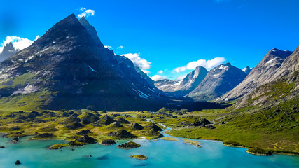 Amazing valley and mountain in Greenland. Many mound and snow top.