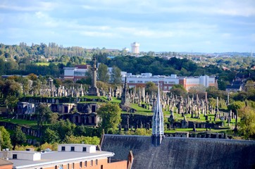 Fototapeta premium Glasgow Necropolis with the spire of the Barony church in the foreground.