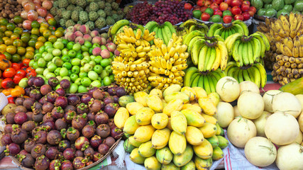 Naklejka na ściany i meble Fruits for sale at the morning market in Luang Prabang, Laos.