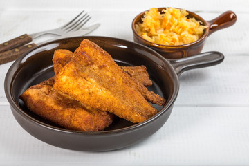 Pieces of cod in breadcrumbs.
