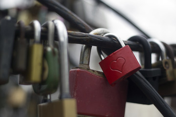 Heart shape on a red love lock