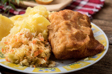 Fried cod fillet served.