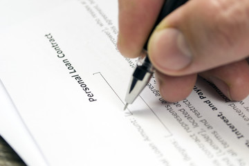 Signing of the contract. Documents on the desktop