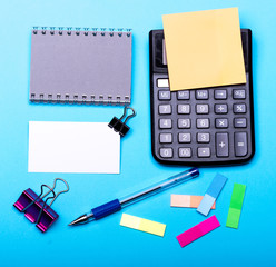 Stationery and calculator. Office supplies and business idea concept